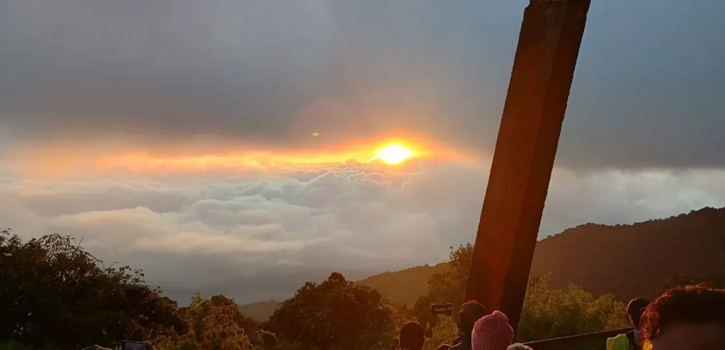 Golden sunrise on the snow-capped peaks of Mount Kanchenjunga from Tiger Hill viewpoint in Darjeeling at dawn